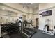 A well-equipped gym with modern equipment and a wall mirror, perfect for staying active at 501 Knights Run Ave # 2101, Tampa, FL 33602