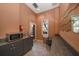 Cozy kitchenette features a microwave, sink, storage cabinets, and neutral tile floors at 501 Knights Run Ave # 2101, Tampa, FL 33602