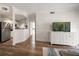 Open-concept living area with modern finishes, stainless appliances, and hardwood floors at 501 Knights Run Ave # 2101, Tampa, FL 33602