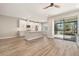 Bright and airy kitchen with center island and large sliding glass doors at 5087 San Martino Dr, Wesley Chapel, FL 33543