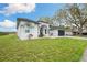 Attractive one-story home featuring a well-maintained lawn and an attached garage at 6140 Silver Oaks Dr, Zephyrhills, FL 33542