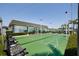 Community shuffleboard courts with benches and well-maintained landscaping at 7847 39Th N Ter, St Petersburg, FL 33709