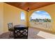 Inviting balcony with table and chairs, perfect for enjoying panoramic views and outdoor dining at 7986 9Th S Ave, St Petersburg, FL 33707
