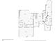 Detailed floor plan of the first floor, featuring a kitchen, living room, garage, and bedrooms at 7986 9Th S Ave, St Petersburg, FL 33707