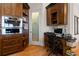Walk-in pantry featuring custom shelving and storage at 7986 9Th S Ave, St Petersburg, FL 33707