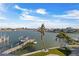 Water view from the balcony overlooking the boat dock, bay, and city skyline, perfect for relaxing and enjoying the scenery at 7986 9Th S Ave, St Petersburg, FL 33707