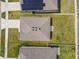 Overhead shot of the home's roof, backyard, and neighboring properties showcasing the lot and neighborhood layout at 8034 Broad Pointe Dr, Zephyrhills, FL 33540