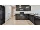 Well-equipped kitchen featuring modern appliances and granite countertops at 8034 Broad Pointe Dr, Zephyrhills, FL 33540