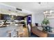Bright updated kitchen features stainless steel appliances and an adjacent dining area at 100 Oakmont Ln # 112, Belleair, FL 33756