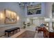 Inviting lobby with a grand chandelier, stylish decor, and comfortable seating arrangement at 100 Oakmont Ln # 112, Belleair, FL 33756
