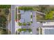 Overhead view of the property showing roof, driveway, and landscaping at 1110 25Th N St, St Petersburg, FL 33713