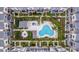 An aerial view of the community featuring a swimming pool, multiple townhomes, and common area at 1110 25Th N St, St Petersburg, FL 33713