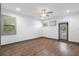 Spacious bedroom with hardwood floors, ceiling fan, and natural light at 1110 25Th N St, St Petersburg, FL 33713