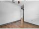 This bedroom features light-colored walls, stylish flooring, and a ceiling fan at 1110 25Th N St, St Petersburg, FL 33713