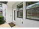Close-up of the home's entrance featuring a welcome mat and modern design at 1110 25Th N St, St Petersburg, FL 33713