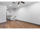 Hallway with hardwood floors and gray trim at 1110 25Th N St, St Petersburg, FL 33713