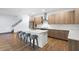 Modern kitchen with seating at the center island and stainless steel appliances at 1110 25Th N St, St Petersburg, FL 33713