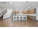 Modern kitchen featuring sleek cabinets, a center island, and stainless steel appliances at 1110 25Th N St, St Petersburg, FL 33713