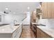 Kitchen featuring a large island with a sink, stainless steel appliances, and modern finishes at 1110 25Th N St, St Petersburg, FL 33713