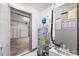 A utility room with a water heater, AC Unit with an open door leading into the garage at 1110 25Th N St, St Petersburg, FL 33713