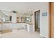 Large bathroom featuring a vanity with double sinks, and marble countertops at 119 Carlyle Cir, Palm Harbor, FL 34683