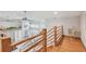Second floor landing with views to the front door and first floor at 119 Carlyle Cir, Palm Harbor, FL 34683