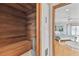 Home sauna with wood paneling and a built-in bench at 119 Carlyle Cir, Palm Harbor, FL 34683