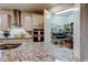 View of a spacious walk-in pantry with shelving and organized food storage at 12704 Palapa Loop, Spring Hill, FL 34610