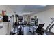 This is a gym with multiple fitness machines, including an elliptical and treadmill, providing convenient exercise options at 19029 Us Highway 19 N # 29E, Clearwater, FL 33764