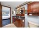 Bathroom boasts wood cabinets and a dual sink vanity at 1975 Levine Ln, Clearwater, FL 33760