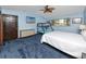 Spacious bedroom featuring carpet, ceiling fan, and bunk beds for extra space at 1975 Levine Ln, Clearwater, FL 33760