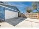 Spacious two-car garage with adjacent fenced area and convenient driveway access, providing ample parking and privacy at 1975 Levine Ln, Clearwater, FL 33760