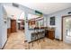 Stylish kitchen features bar seating, granite countertops, and an open layout at 1975 Levine Ln, Clearwater, FL 33760