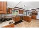 Beautiful kitchen featuring granite countertops and stainless steel appliances at 1975 Levine Ln, Clearwater, FL 33760