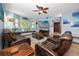 Inviting living room features comfortable seating, a ceiling fan, and a built-in window seat at 1975 Levine Ln, Clearwater, FL 33760