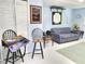 The space includes living area featuring a comfortable couch and stylish accents at 1975 Levine Ln, Clearwater, FL 33760
