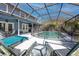 This home has a backyard pool that is fully screened and has a -safety fence at 1975 Levine Ln, Clearwater, FL 33760