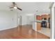 A spacious living room features an open floor plan and seamless transition to the kitchen at 20426 Autumn Fern Ave, Tampa, FL 33647