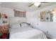 Well-lit bedroom with a comfortable bed, side tables, and plenty of space to relax and unwind at 2102 W Knights Griffin Rd, Plant City, FL 33565