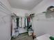 Walk-in closet equipped with metal storage shelving and hanging space at 2745 Horseshoe Dr, Plant City, FL 33566
