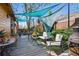Inviting backyard deck with comfortable seating area and shade sails at 3235 8Th N Ave, St Petersburg, FL 33713
