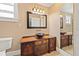 Charming bathroom featuring a unique vanity with vessel sink and decorative mirror at 3235 8Th N Ave, St Petersburg, FL 33713