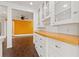 Dining area featuring wood floors and built in cabinets at 3235 8Th N Ave, St Petersburg, FL 33713
