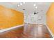 Bright dining area featuring wood floors with views into the kitchen at 3235 8Th N Ave, St Petersburg, FL 33713