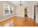 Dining room with hardwood floors, bright windows, and a decorative chandelier at 3235 8Th N Ave, St Petersburg, FL 33713
