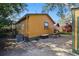 Charming home exterior featuring a delightful side yard with a soaking tub and stone patio at 3235 8Th N Ave, St Petersburg, FL 33713