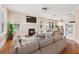 Cozy living room with stylish furniture and a decorative brick fireplace at 3235 8Th N Ave, St Petersburg, FL 33713