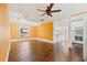 Inviting living room with hardwood floors, textured walls, ceiling fan, and natural light at 3235 8Th N Ave, St Petersburg, FL 33713