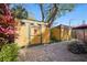 Backyard Outbuildings: Two small sheds or workshops add character to the outdoor space at 3235 8Th N Ave, St Petersburg, FL 33713