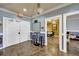 Community hallway featuring tile flooring, access to seating and game room at 4221 W Spruce St # 1123, Tampa, FL 33607